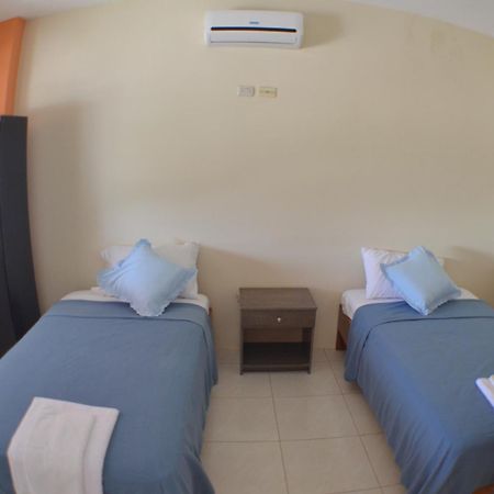 Hostal Tongo Reef بويرتو بكويريزو مورينو الغرفة الصورة