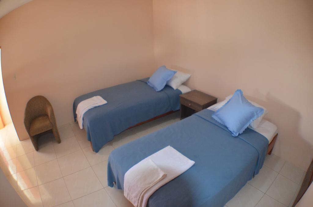 Hostal Tongo Reef بويرتو بكويريزو مورينو الغرفة الصورة
