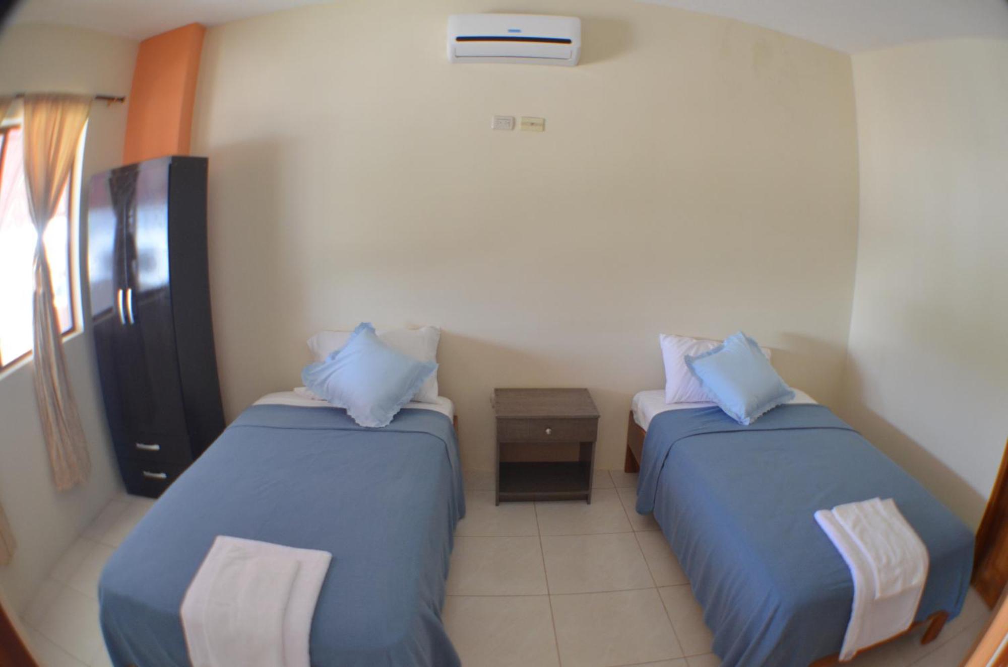 Hostal Tongo Reef بويرتو بكويريزو مورينو الغرفة الصورة