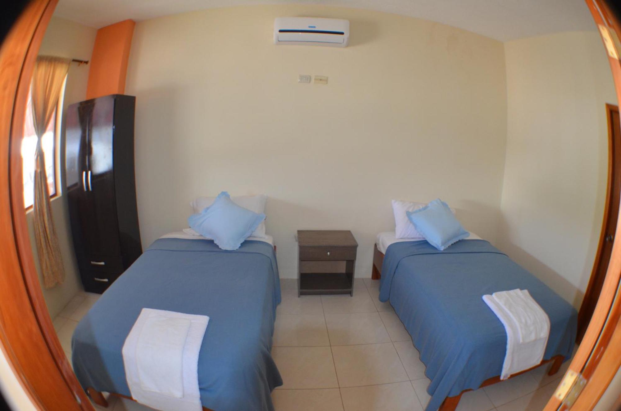 Hostal Tongo Reef بويرتو بكويريزو مورينو الغرفة الصورة