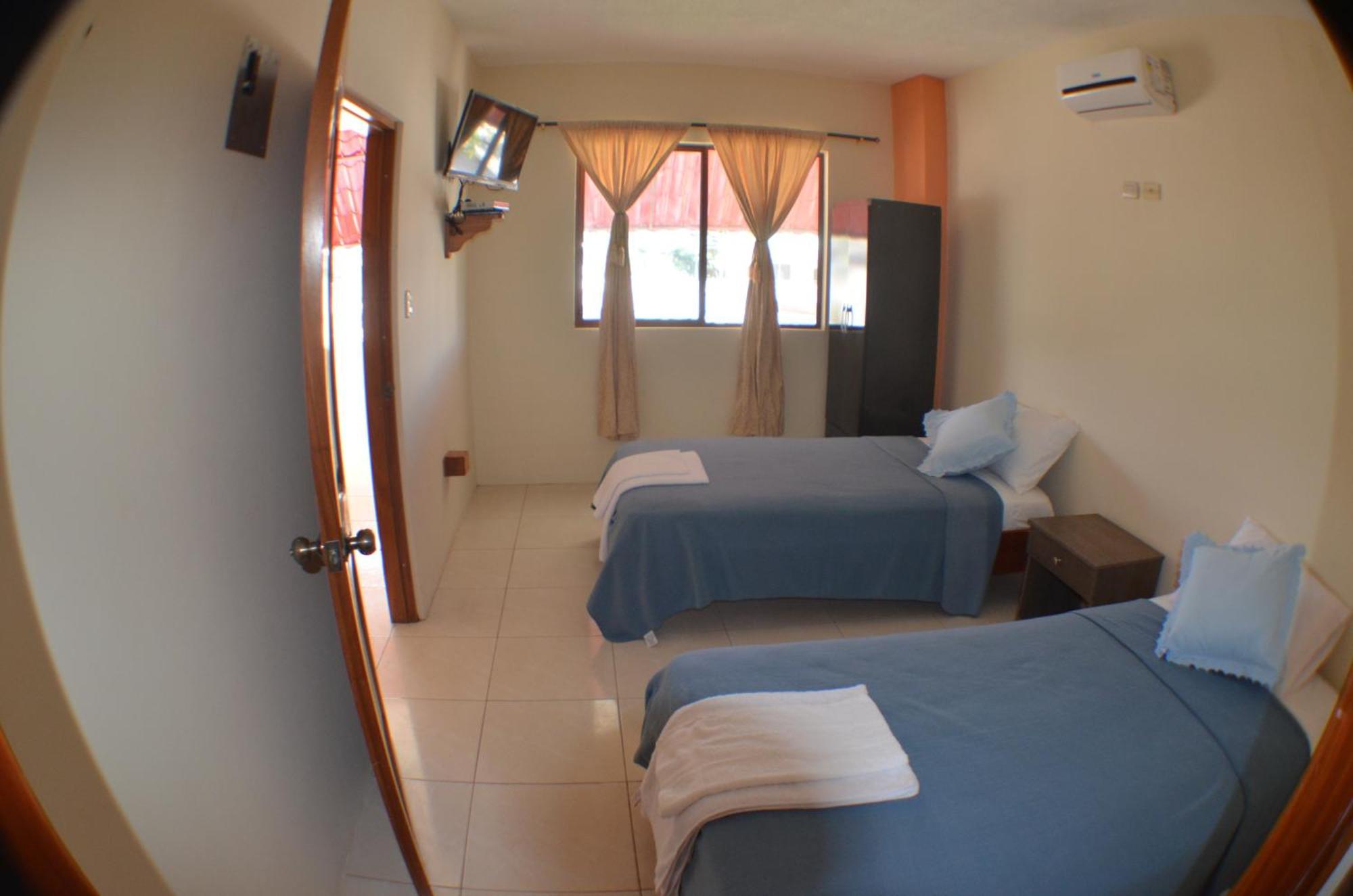 Hostal Tongo Reef بويرتو بكويريزو مورينو الغرفة الصورة